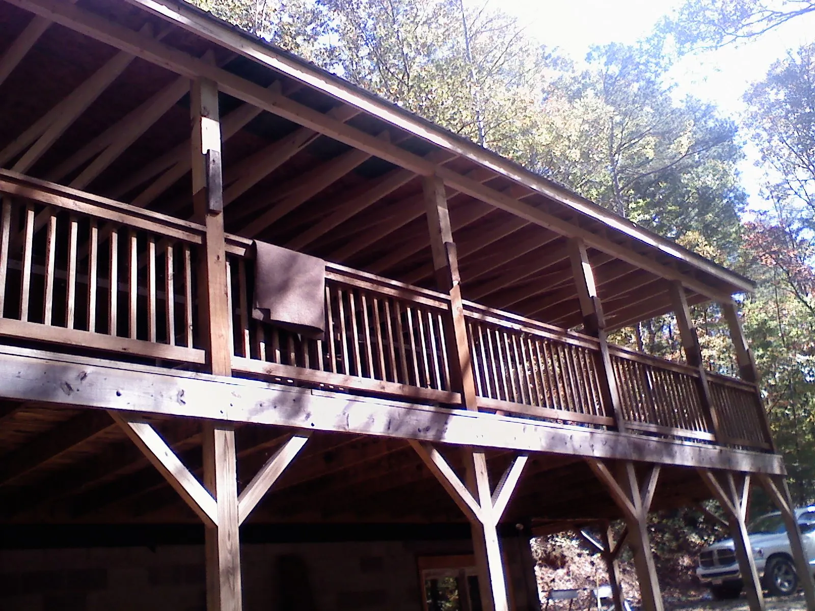 Timber framing under a new elevated porch and deck — Roof Leak Repair in Swanzey by Roofing Brothers